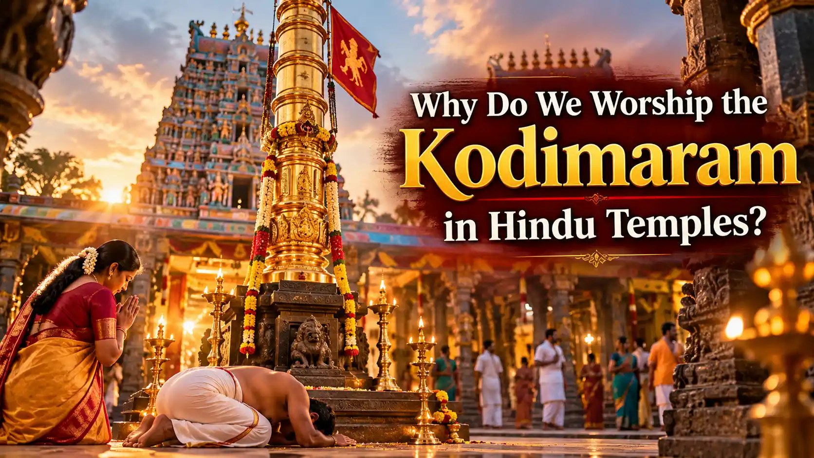 Sacred Kodimaram flagstaff standing before the main shrine of a traditional South Indian Hindu temple.